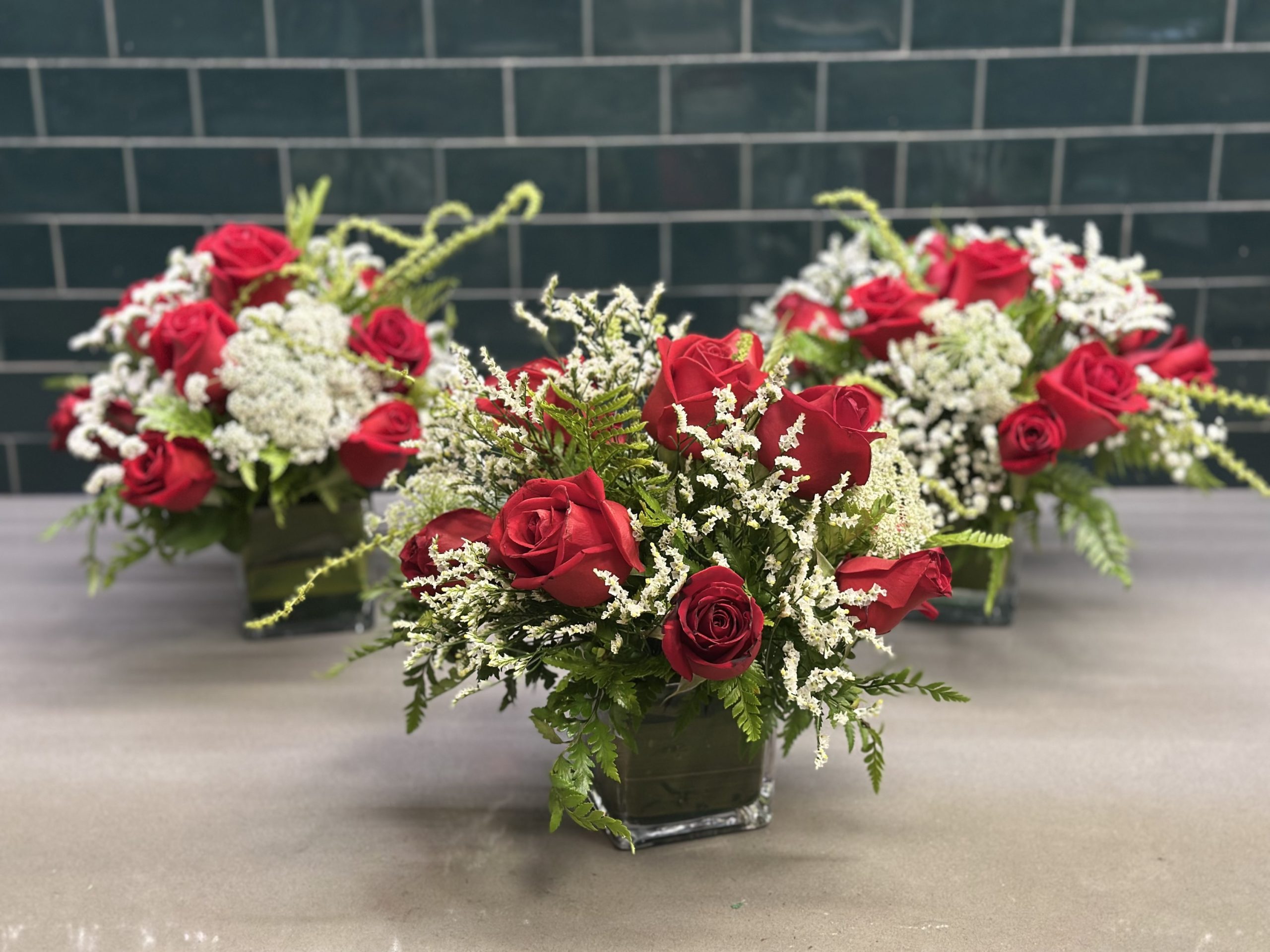 Centro de mesa en cristal con rosas rojas